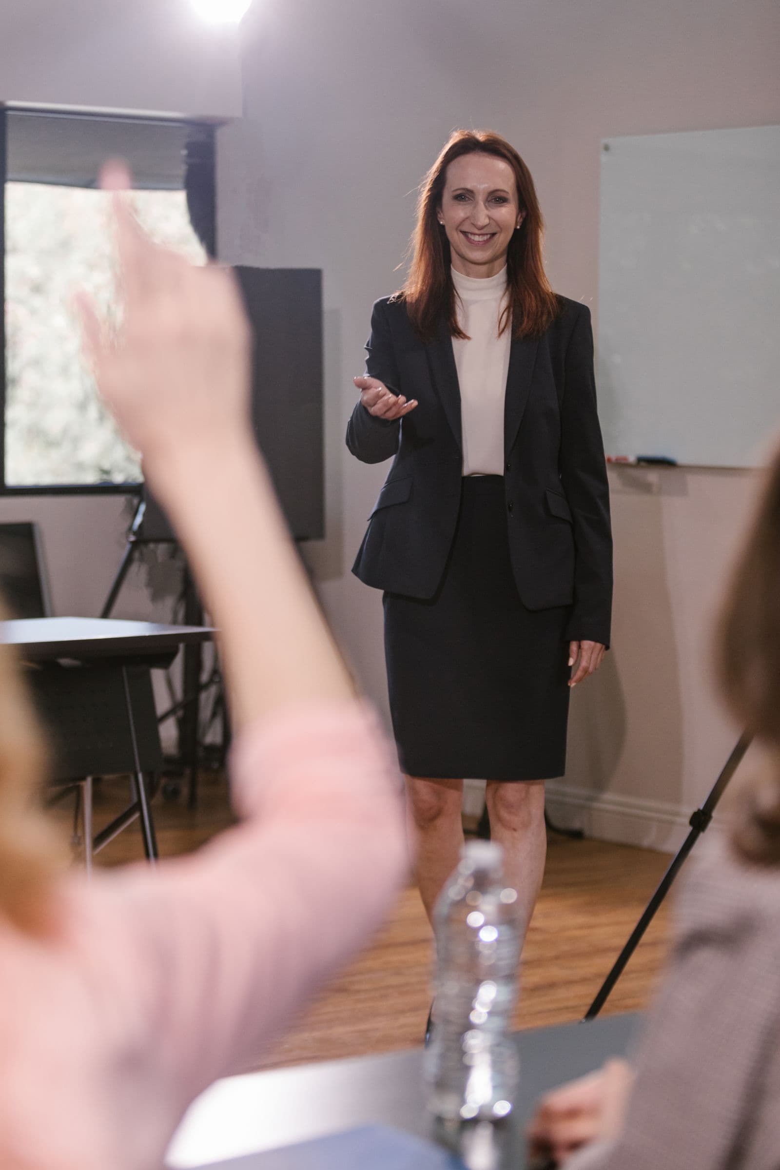 A presenter leading an enterprise team discussion about AI working practices